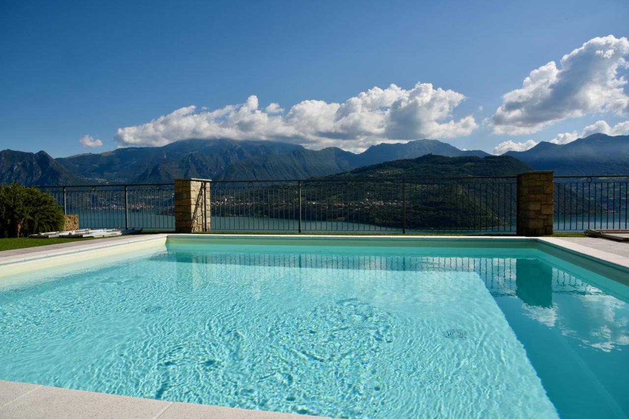 Italian Vacation Homes - La Petite Maison Du Lac Tavernola Bergamasca Bagian luar foto