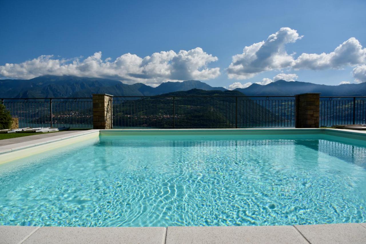 Italian Vacation Homes - La Petite Maison Du Lac Tavernola Bergamasca Bagian luar foto