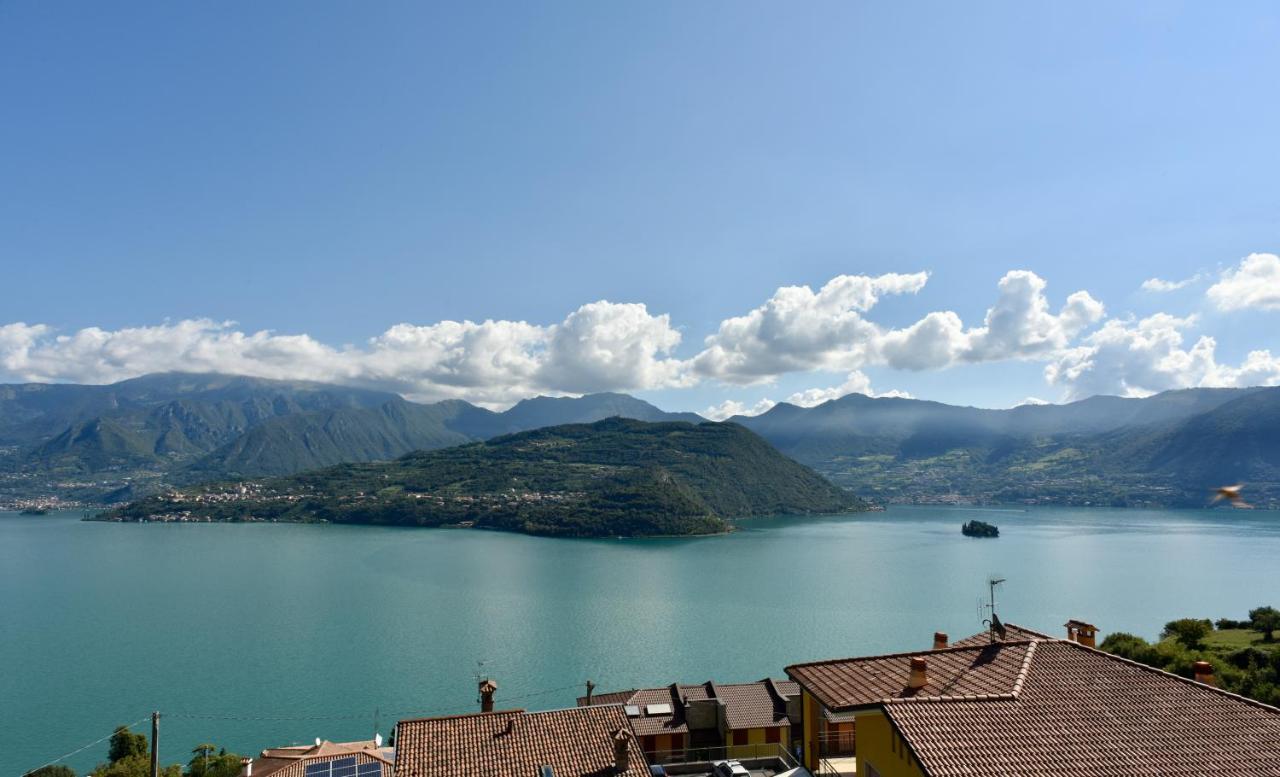 Italian Vacation Homes - La Petite Maison Du Lac Tavernola Bergamasca Bagian luar foto