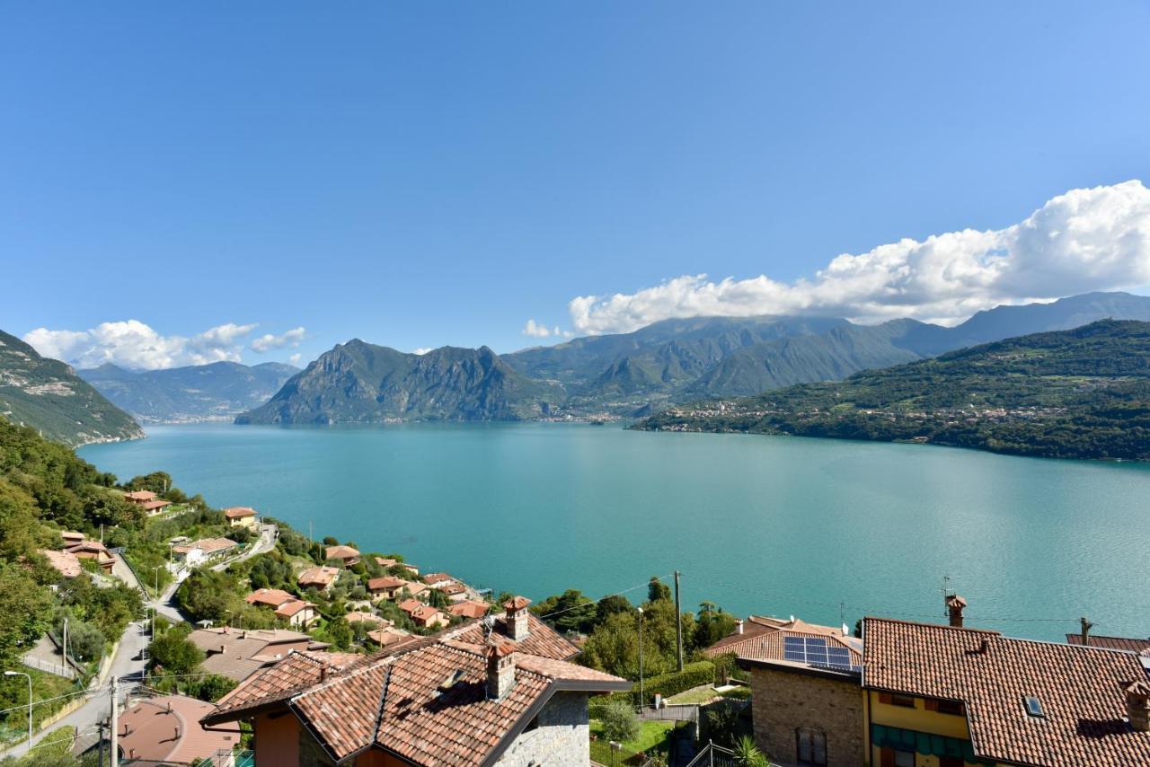 Italian Vacation Homes - La Petite Maison Du Lac Tavernola Bergamasca Bagian luar foto