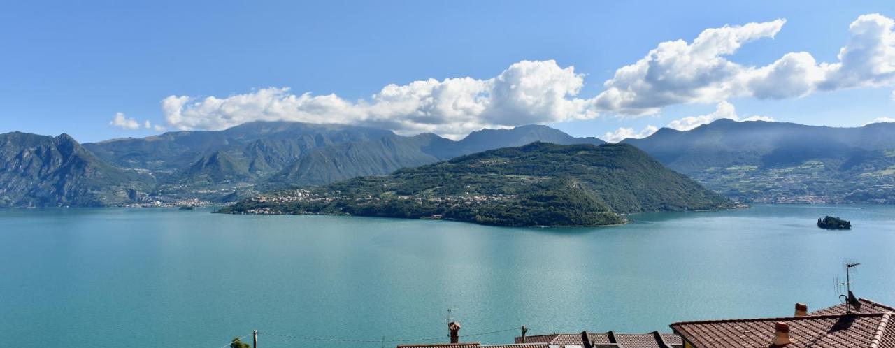 Italian Vacation Homes - La Petite Maison Du Lac Tavernola Bergamasca Bagian luar foto